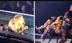Madonna sahnede yere düştü! Profesyonelliğini ortaya koydu